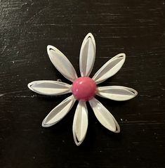 Vintage white and pink enamel flower floral daisy pin brooch. Clasp is in good working order. White Retro Brooch For Gift, White Retro Style Brooch For Gift, Retro White Brooches As Gift, White Retro Brooches As Gift, Pink Flower Brooch Pins, Retro White Flower Jewelry, White Flower Pins For Gifts, White Flower Pins As Gifts, White Flower Brooches With Flower Decoration