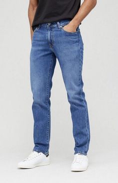 Elevate your fashion style with these men's Levi's 511 slim fit jeans in a cool mid-wash shade. Made of high-quality denim fabric, these jeans feature a zip and button closure, perfect for a casual or semi-formal look. The jeans come in a regular size type, with a waist size of 32 and an inside leg measurement of 30 inches. Levi's 511 slim fit jeans are designed to flatter your figure, with a skinny style that showcases your curves. These jeans are perfect for any occasion and will quickly becom Regular Fit Jeans Men Outfit, Types Of Jeans Men, Levis 511 Men Outfits, Levis Jeans Men, Formal Jeans, Slim Jeans Men, Blue Denim Jeans Outfit, Jeans Pants For Men, Mens Denim Jeans