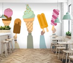 an ice cream shop wall mural with colorful popsicles