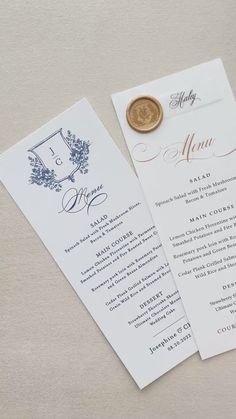 two wedding programs with a wax seal on top