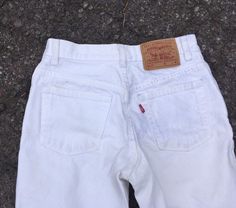 "Beautiful vintage 1990s Levis 517 jeans. 100% cotton denim in classic white. So good for a monochrome white outfit or pair with a vintage chambray top. These can be dressed up or down easily depending on how you style them. 517 model, slim fit boot cut. Made in USA. High waist hits slightly below belly button- not as high as an early 90s ribcage fit. Slim leg with slight flare at hem, more versatile than a full bell bottom. Vintage size 5 jr M. Fits estimated modern XS/S depending on desired fi Classic White Fitted Flare Jeans, Classic White Cotton Flare Jeans, White Classic Streetwear Bottoms, Classic White Streetwear Bottoms, White 90s Jeans For Spring, Retro High Rise White Jeans, Vintage White Streetwear Bottoms, Vintage White Bottoms For Streetwear, Vintage Style White Bottoms For Streetwear