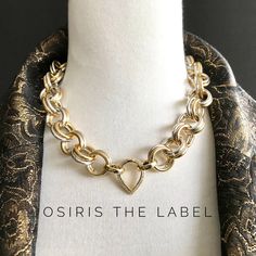 Be unique, bold and beautiful in this fabulous gold and silver designer chain choker.  Elevate your day and expect lots of compliments!  I have always been a lover of mixing metal. Blending gold and silver elements has always been a winning combination for me. It looks spectacular and elegant. The quality is excellent, Nickel Free and lightweight.  The italian craftsmanship exceptional and without doubt they wrote the book on style. The company I work with are one of the oldest and most respected in Italy and many high end designers create chain at this workshop. I've combined the chain with a cute teardrop cz pave hinge clasp which adds another layer of elegance. Versatile as you can feature it at the front as a focal piece, side or back of the neck. My shipment has just arrived from Ital Gold Chain Link Choker For Party, Silver Choker With Gold Chain For Gift, Chunky Gold Metal Necklace, Gold Chunky Chain Choker For Party, Gold Chunky Chain Link Choker, Chic Chunky Chain Necklace Gift, Gold Party Choker With Lobster Clasp, Bold Chunky Gold Jewelry, Bold Gold Chain Link Necklace