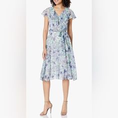 Tommy Hilfiger Mint Green Midi Dress With Blue Floral Print Flutter Sleeves Back Zipper Closure Ruffle Details V Neckline Approximate Measurements (Taken Flat): Length- 44 1/2 Inches Pit To Pit- 20 1/2 Inches Waist- 20 Inches Tags- Floral Spring Summer Mint Green Meadow Flowers Wedding Guest Tommy Hilfiger Summer Beach Dress, Summer Light Blue Floral Print Chiffon Dress, Summer Light Blue Floral Chiffon Dress, Light Blue Floral Print Chiffon Dress, Light Blue Chiffon Dress For Spring, Light Blue Flowy Chiffon Dress With V-neck, Elegant Light Blue Floral Chiffon Dress, Light Blue Sleeveless Chiffon Dress For Spring, Flowy Blue Chiffon Dress With Floral Print