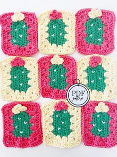 crocheted coasters with green and red designs on them are arranged in rows