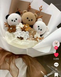 a bunch of stuffed animals sitting in a bouquet