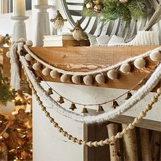 a christmas tree is decorated with ornaments and garland