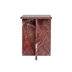 a red marble side table with two doors