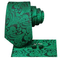 If you're seeking a distinctive touch to elevate your ensemble, explore our Dark Green and Black XL Tie Set at Sophgent. The tie is made of high-quality silk, giving it a luxurious feel and ensuring it will hold its shape well. Whether you're attending a wedding, a job interview, or a night out on the town, this tie is sure to make a statement. Add it to your collection today and elevate your style. 100% Silk Handmade Includes: Tie, Pocket Square and Cufflinks Length: 63" Width: 3.34" Warm iron Elegant Green Business Sets, Elegant Green Gift Sets, Pocket Square Size, Uniform School, Prom Gift, Tall Men, Tie Men's, Cufflink Set, Tuxedo Jacket