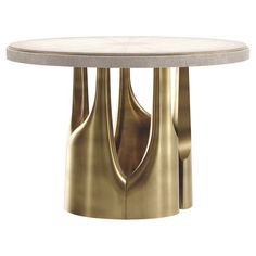 a white table with gold colored legs and a round marble top, on a white background