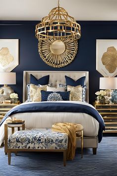 a bedroom with blue walls and gold accents