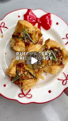 puff pastry brie and honey bites on a red and white plate with bow decoration