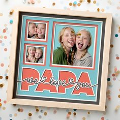 a photo frame with the words we love you papa printed on it, surrounded by confetti