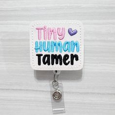 The Trendy Stitcher badges are the perfect way to dress up your badge reels. Use these to hold any badge reels ID's. These also made great gifts for anyone who loves or wears badge reels.   Please select a permanent badge reel or an interchangeable topper. *A topper is a feltie embellishment with a VELCRO® Brand dot attached to the backside.  *A permanent badge reel will come with the feltie permanently adhered to the badge reel. * A VELCRO® Alligator Badge Reel comes with a VELCRO® Dot attached to the Badge Reel and the feltie embellishment so they can be interchangeable. These badge reels are made to order so if you would like a different color thread or vinyl/felt, simply put it in the notes at check out and I can make that change for you.  This listing is for 1 badge reel that is creat Customizable White Badge Reel For Crafting, Customizable White Badge Holders For Crafting, Customizable White Badge Holders For Personal Use, Novelty Personalized Adjustable Badge Holders, Adjustable White Badge Holder For Hobby, Novelty Personalized White Badge Reel, Customizable White Badge Reel, Cute Personalized White Badge Reel, Customizable Adjustable White Badge Holders