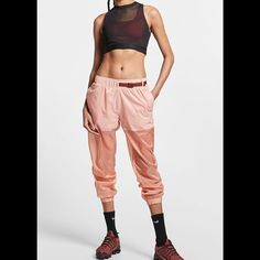 Nike-Womens-Sportswear-Tech-Pack-Nike Sportswear Tech Pack Rare Sold Out Hard To Find Nwt Women's Woven Trousers The Nike Sportswear Tech Pack Trousers Are Made From Lightweight, Shiny Fabric That Transitions From Opaque At The Top To Tapered, Translucent Legs. A Silky Jersey Lining Keeps You Comfortable. Colour Shown: Rose Gold/Black Nike Jogger, Women Jogger Pants, Nike Joggers, Tech Pack, Shiny Fabric, Track Pant, Sports Football, Woman Weaving, Nike Tech