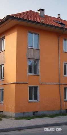 Tall orange building with a red roof and balconies on the top of it's windows. Example of PANTONE 5483 color. PANTONE, PANTONE 5483. Cute AI generated scenic views.Follow us and visit our site for more amazing content! #illustration #PANTONE #travelphotography #building #skyscraper #digitalart #travelling #windows. #landscape #landscapephotography #travelgram #nature #weird #top #nature_brilliance