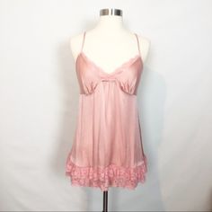 Silk Chemise With Lace Detail. Adjustable Straps New Without Tags. Never Been Worn Bust : 18” Length : 30” I0337 Flirty Pink Camisole For Spring, Feminine Summer Sleepwear, Flirty Summer Sleepwear With Built-in Bra, Feminine Camisole Sleepwear With Built-in Bra, Flirty Pink V-neck Sleepwear, Feminine Lace Trim Camisole For Bedtime, Feminine Bedtime Camisole With Lace Trim, Feminine Spaghetti Strap Camisole For Pajama Party, Feminine Summer Sleep Camisole