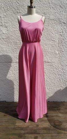 "1980s \"Janice\" pink maxi dress was worn as a bridesmaid dress. Has a few stains in the skirt, a small run and a few pinholes at the waist. This girl had a good time! Sold as is. Back zipper closure. Hanger loops. Blouson waist. Measurements: Bust - 32\" Waist - 24\" Length - 57\" Hem Sweep - 152\"" Pink Maxi, Maxi Robes, Pink Maxi Dress, Good Time, Dress Clothes For Women, Bridesmaid Dress, Balayage, Dress Outfits, Bridesmaid Dresses