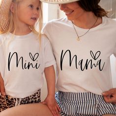 Comfort Colors® Mama Mini Matching Set, Mother's Day Gift, Gift For Mama T-Shirt, Mommy And Me Outfits, Custom Mama Shirt, Mom Gift A Comfort Colors shirt is a type of casual t-shirt that is known for its softness, relaxed fit, and muted color palette. Typically made from 100% cotton, these shirts have a vintage feel and are often favored for their comfortable, worn-in look. This classic unisex jersey short sleeve and long sleeve tees fits like a well-loved favorite. Soft cotton and quality print make users fall in love with it over and over again. These t-shirts have-ribbed knit collars to bolster shaping. The shoulders have taping for better fit over time. Dual side seams hold the garment's shape for longer.  *6.1 oz./yd² (US), 10 oz/L yd (CA), 100% ring spun cotton, 30 singles *Garment White Tops With Lettering For Mother's Day, White Slogan Top For Mother's Day, Matching Crew Neck Tops For Mother's Day, White T-shirt With Letter Print, Short Sleeve Tops With Lettering For Mother's Day, Family Matching Slogan Tops For Mother's Day, Floral Svg, Mama T Shirt, Mama Shirts