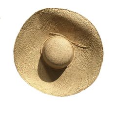 "Large brim sun hat. French Market Hat. Floppy Hat. A French style pergola straw hat for keeping you sun safe in style.  🌀Natural straw hat 🌀Adjustable with tie  🌀Casual hat with lots of style 🌀Lightweight and easy to flat pack for travel One Size fits most. Crown size or inner circumference: 22-23\" or 58-59 cm. Brim width: 6\" or 15 cm. Brim to brim: 19\" or 48 cm. Crown height: 4\" or 10 cm. Raffia Straw Crafted from 100% natural organic raffia so colours may vary slightly. Sustainably gr Casual Straw Hat, Pack For Travel, Hat French, Raffia Sun Hat, Straw Crafts, French Hat, Beige Hat, Raffia Hat, Hat Wedding