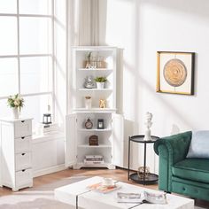 a living room filled with furniture and a large window