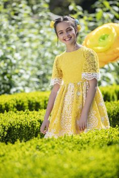 Cotton lace detail over a yellow dress Fitted Lace Dress With Lace Sleeves For Dress-up, Short Sleeve Lace Bodice Party Dress, Spring Party Lace Dress With Lace Bodice, Lace Dress With Lace Bodice For Spring Party, Summer Lace Dress With Lace Bodice For Dress-up, Fitted Lace Dress For Dress-up In Spring, Spring Fancy Dress With Short Sleeves, Spring Dresses With Lace Bodice, Summer Dress With Lace Bodice And Short Sleeves