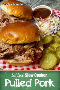 two pulled pork sandwiches with coleslaw and pickles on a red and white checkered plate