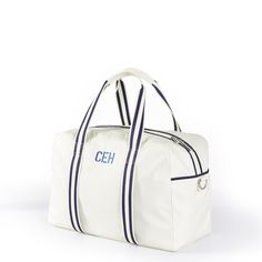 With a classic and sleek design, this bag is ready for more sports than a decathalon. Made from wipeable nylon with contrast piping, this flexible duffle has ample pockets and compartments for all your gym or sports essentials, including a shoe pocket to keep dirty shoes separate and a slip pocket for your water bottle. The striped straps are unstitched on one side, making the perfect slot for a rolled-up yoga mat or towel. Not just for the actively inclined, use it as a stylish overnighter for Sporty Everyday Nylon Travel Bag, Sporty Gym Bag For Sports, Functional Weekend Duffle Bag, Sporty Nylon Duffle Bag With Luggage Sleeve, Sporty Nylon Duffle Bag For Sports, Sporty Rectangular Weekend Travel Bag, Sporty Rectangular Duffle Bag For Everyday Use, Sporty Everyday Rectangular Duffle Bag, Sporty Nylon Weekender Bag For Everyday Use