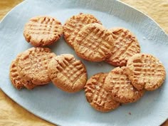 six peanut butter cookies on a blue plate