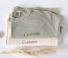 "Custom Embroidered Comfort Colors T-shirt Features 6.1 oz., 100% ringspun cotton Preshrunk, soft-washed, garment-dyed fabric 1\" ribbed collar with double-needle topstitched neckline Double-needle stitched sleeves and bottom hem Twill taped shoulder-to-shoulder Set-in sleeves 🌺 Embroidered on a 4''x4'' Area 🌺 You can choose if you'd like it centered or on the pocket area 🌺 Shiny Threads!" Embroidered Tshirt Ideas, Embroidered T Shirt, Comfort Colors Sweatshirt, Custom Tee, Embroidered Gifts, Embroidered Tee, Etsy Personalized Gifts, Custom Sweatshirts, Embroidered Sweater