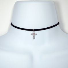 "This choker features a sterling silver cz cross measuring 15 mm x 9 mm (just a bit over half an inch tall). The suede is made in Greece, and is adjustable from 12.5\" to 14.5\" in length. The cross is available in silver, gold or rose gold. All are sterling silver base metal. The clasps will be made to match the charm. If unspecified the suede will be in black. If you would like another color please ask, I have may options including: dark brown saddle brown navy blue maroon/burgundy grey ivory Adjustable Cross Pendant Jewelry, Adjustable Cross Choker For Gifts, Adjustable Silver Cross Choker, Lace Camisole Top, Cross Choker, Orange Calcite, Saddle Brown, Lace Camisole, Ivory White