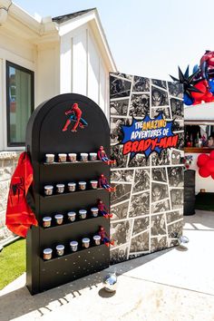 the amazing spider - man birthday party is set up in front of an ice cream truck