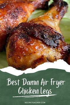 the best damn air fryer chicken legs recipe on a green plate with lettuce