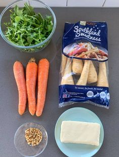 carrots, lettuce and other ingredients on a table