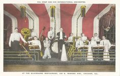 an old photo of people standing in front of a red and white striped wall with gold trim