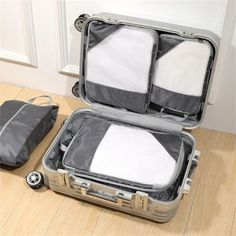 1. Keep your luggage organized and compact with the DEKAXID 4 Set Suitcase Compression Packing Cubes. Made from durable Oxford cloth, these soft packing cubes are perfect for versatile travel occasions. 2. Stay neat and tidy on the go with the DEKAXID Luggage Cubes with Shoe Bag. These travel essentials are designed to keep your clothes and accessories in place, with a convenient zipper closure and solid pattern. 3. Pack smarter with the DEKAXID Travel Luggage Packing Cubes. These soft and versa Multifunctional Packable Rectangular Travel Bag, Multifunctional Foldable Nylon Travel Accessories, Packable Multifunctional Rectangular Travel Bag, Multifunctional Portable Travel Accessories For Trips, Multifunctional Portable Travel Accessories, Portable Multifunctional Nylon Travel Accessories, Multifunctional Portable Luggage For Trips, Functional Foldable Travel Accessories For Trips, Foldable Nylon Travel Bag For Trips