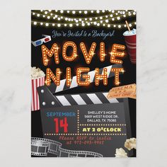 a movie night birthday party with popcorn, soda and tickets