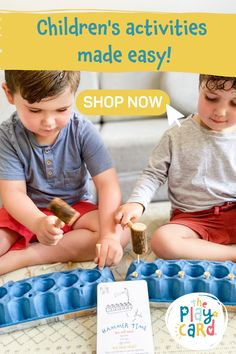 two children are playing with an egg crate and some sort of crafting tool on the floor