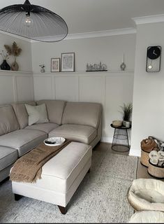 a living room filled with furniture and decor