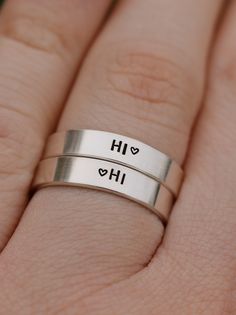 This Hi Speech Bubble Ring Set is the perfect accessory for any Heartstopper fan. Crafted with sterling silver and featuring Nick and Charlie's infamous "Hi's" from one of the top LGBTQIA+ teen dramas, it's the premium way to show your love for the series. The Heartstopper-inspired design gives this set an eye-catching appeal. Product Details: Materials: Sterling Silver Color: Silver Size: 4mm Two Matching Rings You will receive two hand-stamped sterling silver rings filled with a black enamel f Lesbian Promise Rings, Matching Things For Best Friends, Matching Rings For Best Friends, Hi Hi Heartstopper, Lesbian Rings, Pride Rings, Most Expensive Engagement Ring, Matching Jewelry For Couples, Expensive Engagement Rings