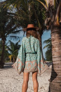 Product Details: Dreaming of the beach Open front Long sleeves Bohemian style Material: Cotton, Rayon Festival Boho Print Beachwear Cover-up, Casual Boho Print Festival Cover-up, Long Sleeve Floral Print Beach Dress For Beach Season, Long Sleeve Floral Print Beach Dress, Long Sleeve Floral Beach Dress For Beach Season, Boho Print Cover-up With Kimono Sleeves For Beach Season, Tropical Long Sleeve Cover-up For Beach Season, Spring Beach Boho Dress With Long Sleeves, Hippie V-neck Cover-up For Vacation