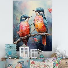 two colorful birds sitting on a branch in front of a painting