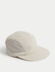 a white hat with mesh detailing on the side