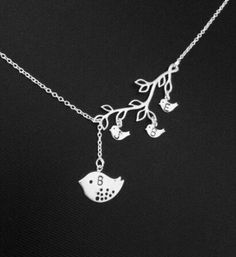 Beautiful  family 3 baby bird necklace in sterling silver  chain(silver or gold )you can choose any and leave a message during check out Note: plz take a look at the 2nd picture, the Christmas card will be included with the necklace and exact same card you seen in the picture Measurement+meterials Mama bird measure 11x17mm silver plated  baby   bird----9x13mm rhodium plated  branch measure 20x37mm rhodium plated  the necklace will comes in a gift box nicely tied up with the ribbon for matching e Silver Bird Necklace, Mama Bird, Branch Necklace, Silver Bird, Star Chain, Bird Necklace, Baby Bird, Chain Silver, Beautiful Family