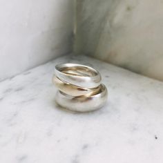 Odell Ring No.1 & No. 2 Unique Rings With Polished Round Band, Unique Rings With Polished Finish And Round Band, Hand Forged Round Band Promise Ring, Hand Forged Round Band Rings For Promise, Silver Domed Heirloom Rings, Timeless Silver Domed Rings, Timeless Handmade Rings For Anniversary, Handmade Timeless Rings For Anniversary, Heirloom Hand Forged Round Band Rings