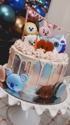 there is a cake decorated with animals on it