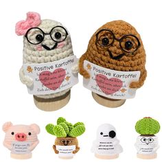 three small crocheted animals with glasses on their heads, one holding a sign that says positive kartoffee