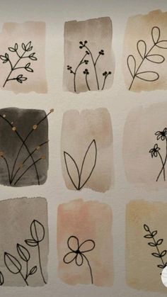 nine different types of flowers drawn in watercolor on white paper with brown and black ink