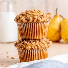 three pear muffins stacked on top of each other