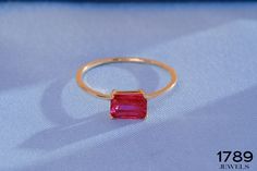 Here's baguette ruby birthstone ring 14K solid gold anniversary ring by 1789 Jewelry ring! This customizable red gemstone ring can be best anniversary gift ring as a customizable ring for girlfriend! Single birth stone anniversal jewelry is will be exciting gift for mother, daughter or women.  Baguette birthstone and rectangle stone ring can be switched with her birthstone and you can create your own customizable ring. If you re looking red anniversary ring and baguette ruby ring, here's the stu Red Rectangular 14k Gold Ring, Emerald Cut Hallmarked Ruby Ring In 14k Gold, Red Rectangular 14k Gold Jewelry, Rectangular Red 14k Gold Jewelry, Emerald Cut Red Birthstone Ring In 14k Gold, Red 14k Gold Emerald Cut Jewelry, Gift Baguette Cut Ruby Ring, Red Emerald Cut 14k Gold Jewelry, Emerald Cut Red 14k Gold Jewelry