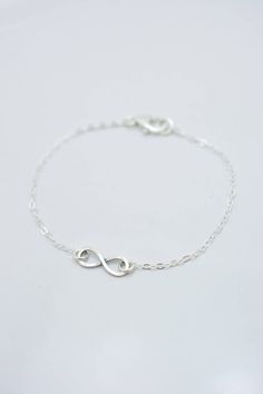 HAND-MADE OF SOLID STERLING SILVER PARTS - A GREAT KEEPSAKE I make this beautiful bracelet using a tiny 1/2 inch sterling silver infinity charm with an antiqued finish. Set on sterling silver chain, this bracelet secures with a lobster clasp. Each comes in a gift box, perfect for gift-giving. These make great group gifts. SIZING - IMPORTANT: To determine bracelet size, measure around your wrist and add 1/2 inch to get your bracelet size. Do not order in your exact wrist measurement as it will NO Hypoallergenic Sterling Silver Infinity Jewelry, Hypoallergenic Infinity Sterling Silver Jewelry, Everyday Nickel-free Infinity Jewelry, Simple Silver Jewelry For Friendship, Sterling Silver Infinity Bracelets For Everyday, Sterling Silver Infinity Bracelet For Everyday, Elegant Sterling Silver Charm Bracelet For Friendship, Elegant Sterling Silver Friendship Charm Bracelet, Minimalist Infinity Jewelry For Friendship